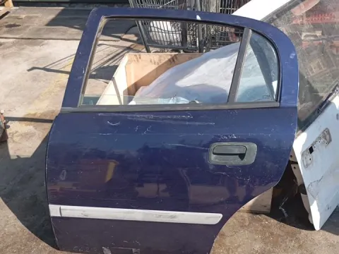 Πόρτα Πίσω Αριστερή (Με Νύχι) (Λίγο Χτυπημένη) για OPEL ASTRA (1998 - 2004) G Hatchback - 5dr *Γ* Πόρτα Πίσω Αριστερή (Με Νύχι) (Λίγο Χτυπημένη) για OPEL ASTRA (1998 - 2004) G Hatchback - 5dr *Γ*